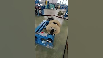 Rewinding machine in customer workshop,  active pay-off machine+dancer + coil take-up machine #cable