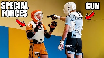 8 Martial Artists vs Armed Attacker