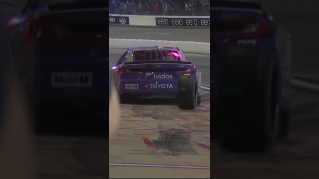 bubba Wallace loses a tire pits in the 19 Joe Gibbs team pit