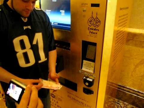 Buying gold in a vending machine in Abu Dhabi at Emirates palace! - YouTube