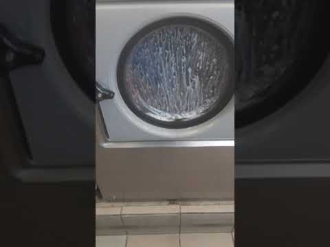 Me at a laundromat recording washing machines doing their purpose.