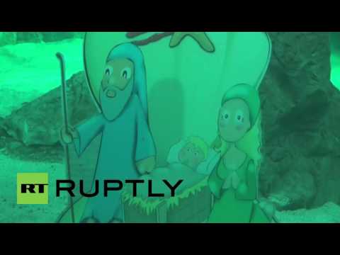 Spain: Divers install nativity scene into Madrid shark tank!
