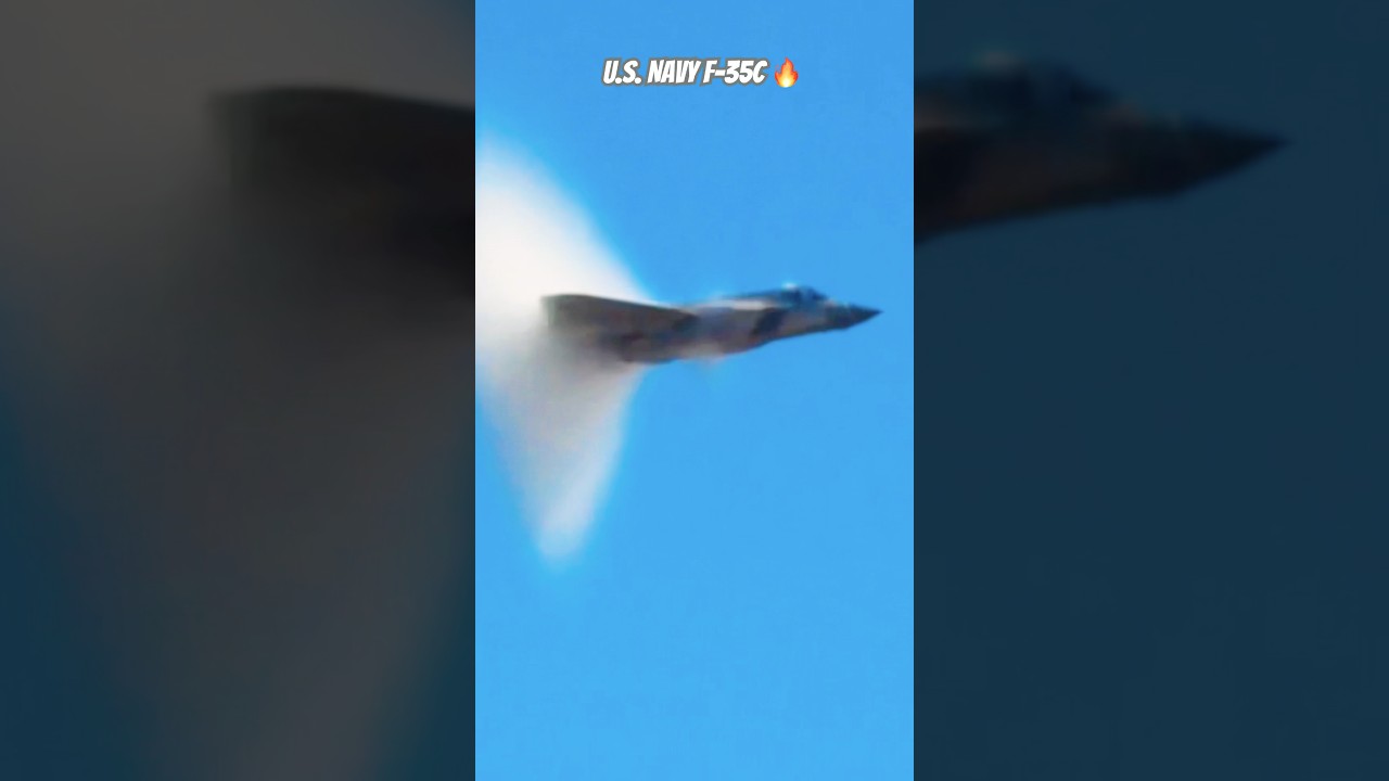 U.S. Navy F-35C Carrier Variant forming vapors on high speed pass