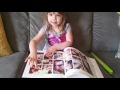 Looking through her Shutterfly book