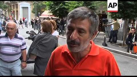 Angry protests coincide with return of eurozone debt inspectors