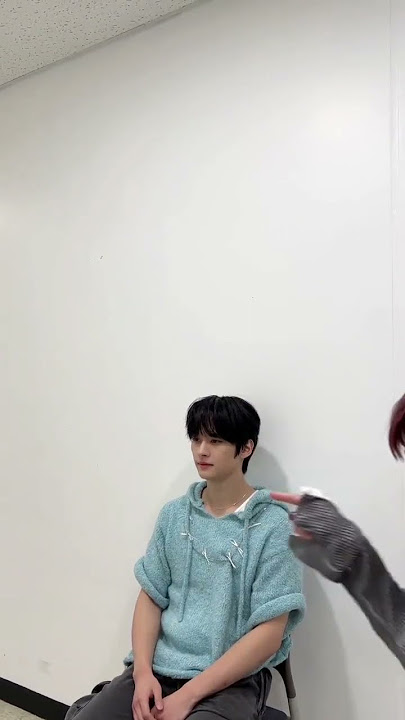 Lee Know just sat their while innie came into frame and channie poked him