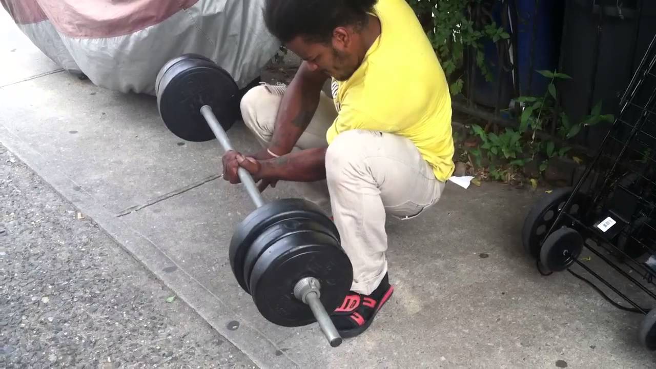 Up-Top workout- Guy lifts and curls 120lbs. With one hand. LongBar!!!