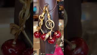 Coach and Amazon Cherry Charm Comparison! What do you think? 🍒👜 screenshot 1