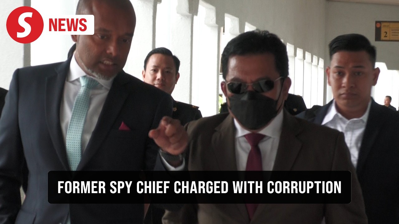 Former intelligence chief charged with graft