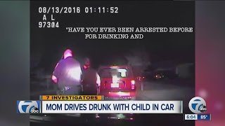 Mom caught on camera drunk driving with child in car