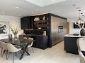 Diane Berry Kitchens Matt black &amp; metallic