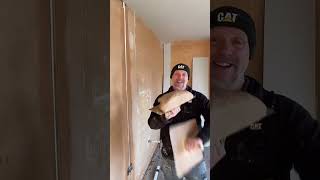 Plastering a chase with undercoat. Bonding