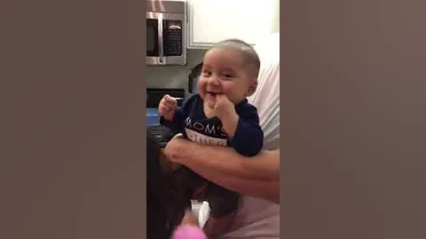 Erika making Elijah laugh