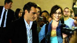 Joaquin Phoenix signing autographs for fans after he tapes a talk show in hollywood