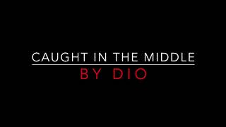 DIO - CAUGHT IN THE MIDDLE (1983) LYRICS