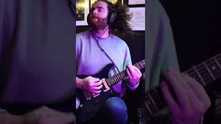 Midra learns to play guitar