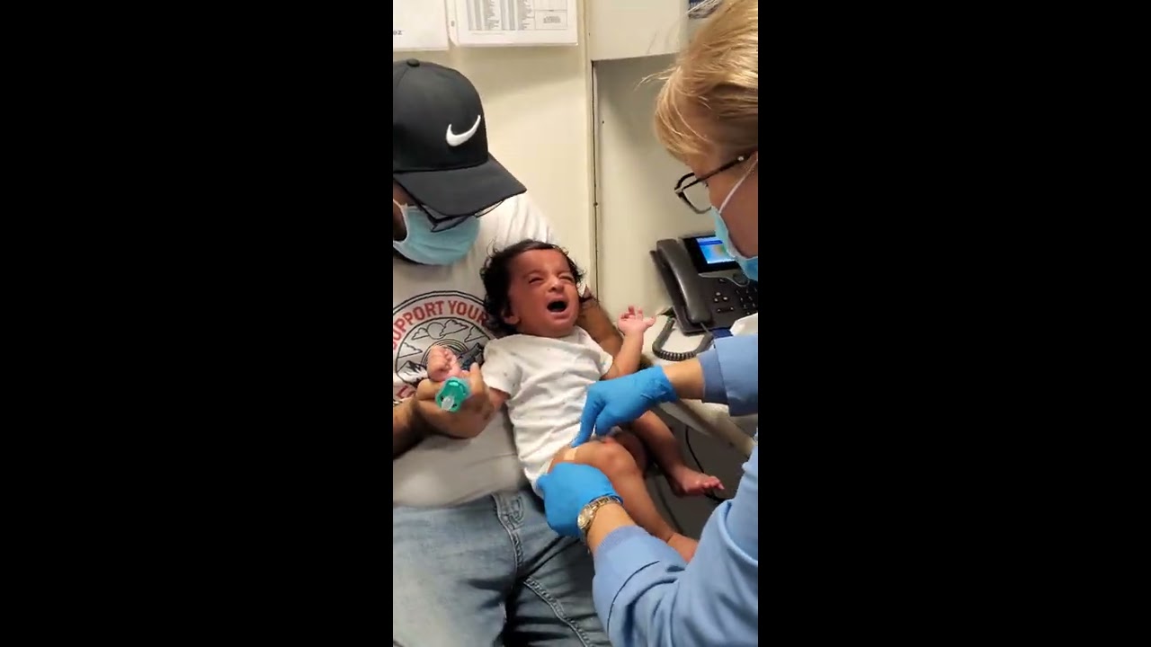 our twins boys get their 4 month vaccinations l twin boys 4 month shot l baby 4 month check up