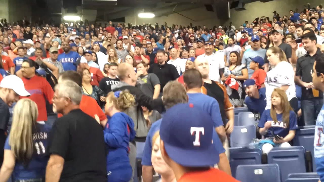 Fan fight at Texas Rangers game YouTube