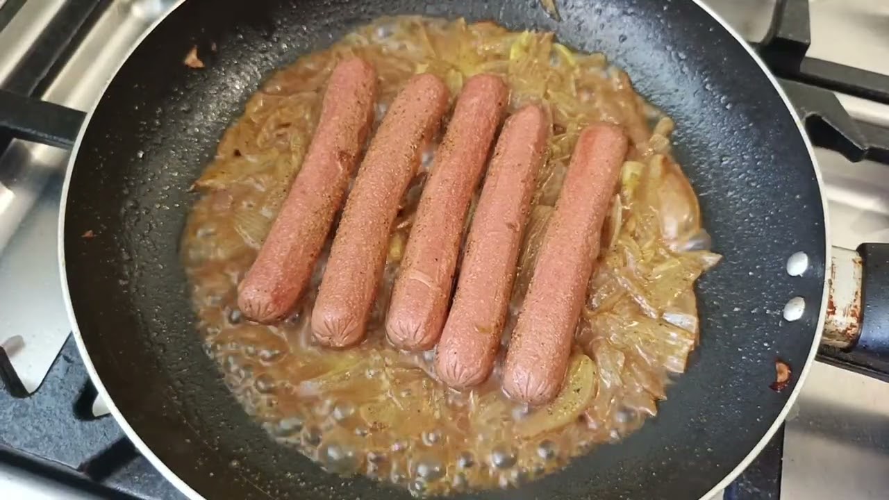 Cooking delicious hot dogs with eggs and cheese