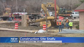 Ground Gives Way Under Heavy Equipment At Boulder Construction Site