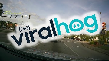 Red Light Runner Has Close Call With Traffic || ViralHog