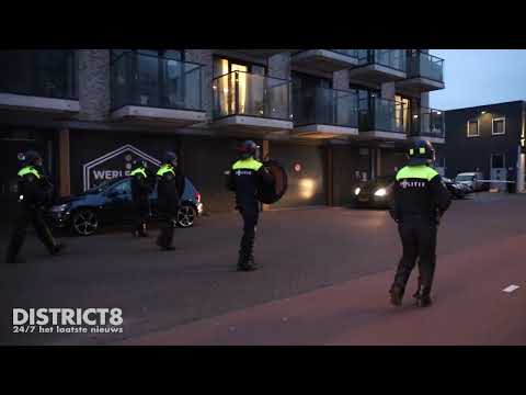 GRIP 2 na rellen Eritreers, politieauto?s in brandgestoken en traangas ingezet Fruitweg Den Haag