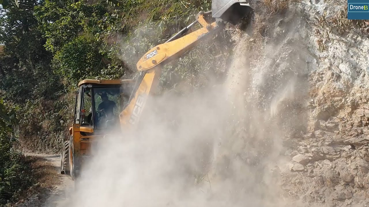 Cutting Rocky and Dusty Hill-JCB Backhoe Loader-Making Hilly Vehicle Passable Road