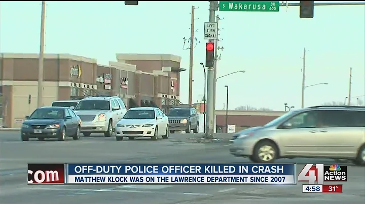 Lawrence police officer killed in wreck