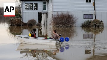 Residents clean up and assess damage after Washington state flooding