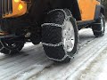 Jeep Rubicon with tire chains vs steep snow covered hill