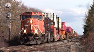 Nice Pair of EMD SD75Is Lead Stack Train CN 123 Pass Painsec Junction West at Track Speed