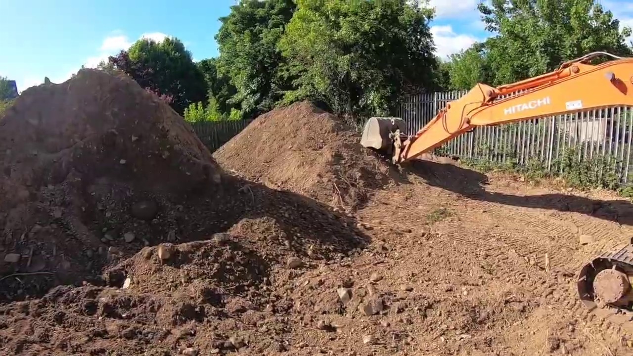Grading out topsoil YouTube
