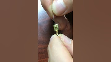 Go pin gauge on a terminal (0.187 x 0.032)