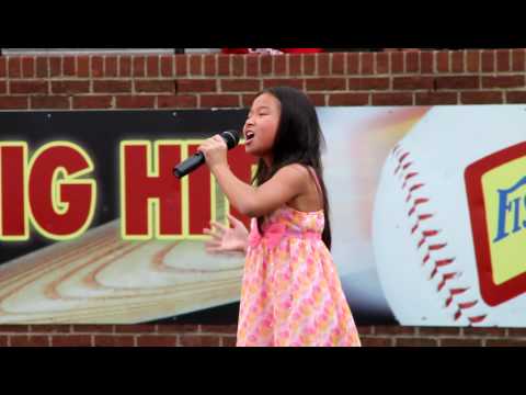 A hair-raising performance by 8 year old Dominique Dy singing the Star Spangled Banner / National Anthem for Nashville Outlaws baseball team at Hawkins Field / Vanderbilt University's (Commodores) baseball stadium in Nashville, Tennessee (TN) on 07/25/2010. The Nashville Outlaws are a collegiate summer baseball team of the Prospect League. They are located in Nashville, Tennessee, and are named for the city's association with country music, particularly the outlaw country genre which was popular during the late 1960s and 1970s. The team plays its home games at Vanderbilt University's Hawkins Field, which opened in 2002 and holds 3700 spectators. The Outlaws were established in 2010 as an expansion team of the Prospect League. Baseball's origins in Nashville, Tennessee have been traced back to as far as 1860.[4] In 1885, the Nashville Americans became the city's first professional baseball team as a charter member of the Southern League. The Vanderbilt Commodores were the city's first collegiate baseball team, beginning play in 1886. Since then, Nashville has been represented by the Blues, Tigers, Seraphs, Vols, Sounds, and Xpress minor league teams. Belmont University, Lipscomb University, and Trevecca Nazarene University operate collegiate programs in the city. The Nashville Outlaws were created in 2010 as an expansion team of the Prospect League. The Outlaws were founded by three former Nashville Sounds executives: Brandon Vonderharr, Jason Bennett, and Chris Snyder. In <b>...</b>