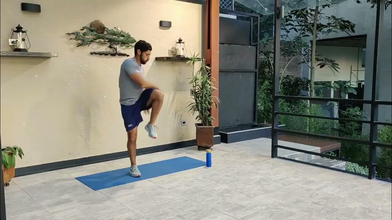 Twist Standing Knee Raises / Elevación Rodillas Parado con Rotación