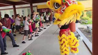 School kids learning basic "lion dance" steps