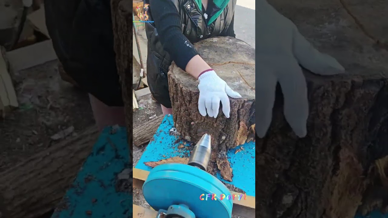 Cut the wood into firewood with an electric pointed chopper