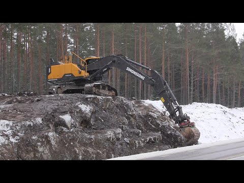 Volvo EC300E removing topsoil