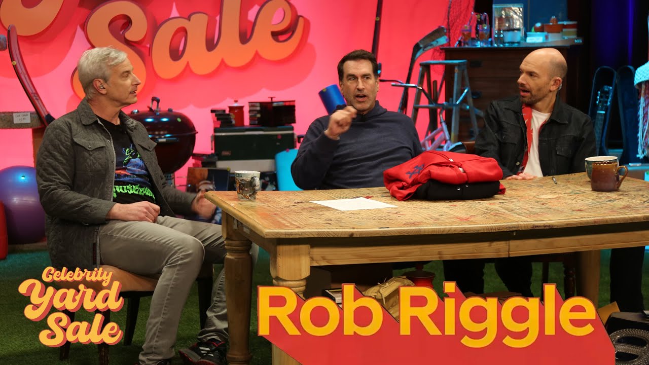 Rob Riggle Analyzes Old Red Carpet Photos on Celebrity Yard Sale YouTube