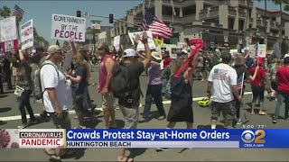 An estimated 3,000 people protested to "reopen america" today in
huntington beach. the city filed for a temporary restraining order
block governor's o...