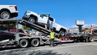 100k GMC Truck almost falls off Semi!