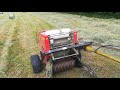 Kubota compact tractor and mini round baler