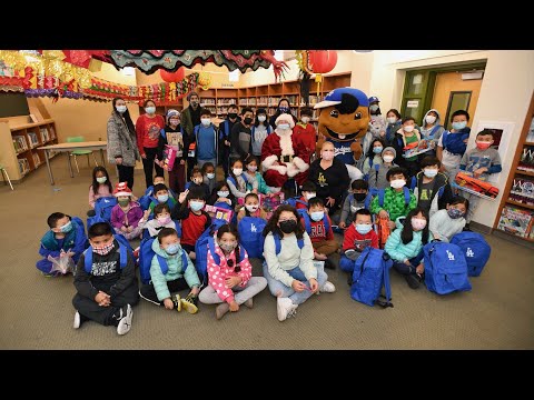 Santa & Los Angeles Dodgers surprise local students with gifts