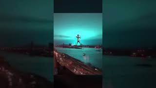 Blue lights over new york with dancing alien