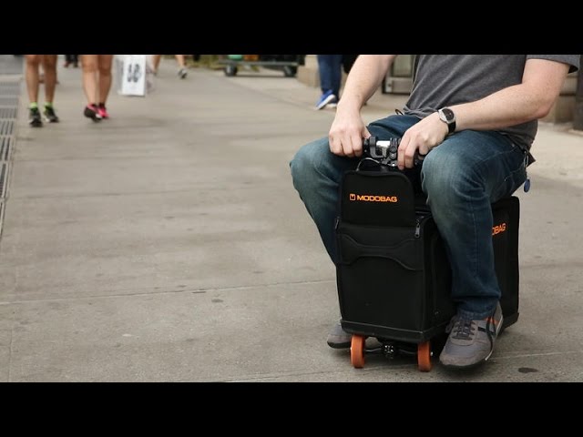 This Electric Scooter Suitcase Is the Lazy Traveling Man's Dream Bag