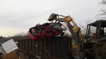 Backhoe loading scrap