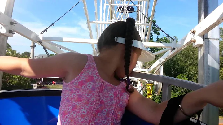 A scared Little girl on the Ferris Wheel in Lawrence