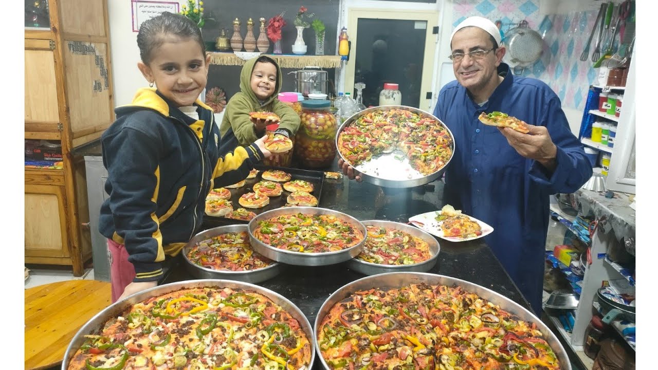 البيتزا علي أصولها 🍕و السر في العجينة الهاشة الطرية 👌خلي العيال تهيص🥳