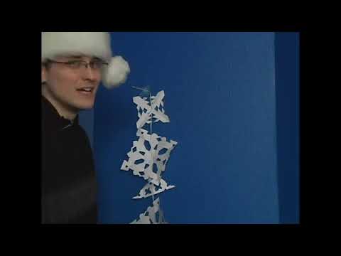 How to Hang Paper Snowflakes on a Wall