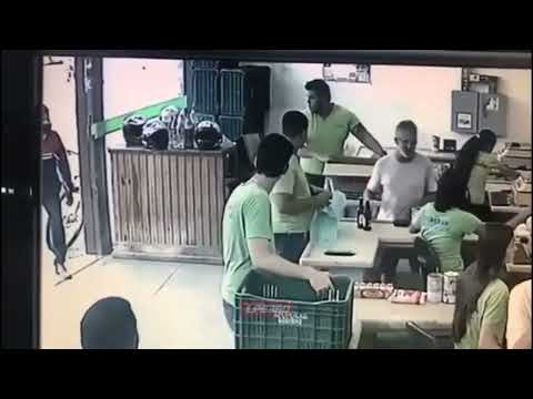 Staff and customers ignore robber